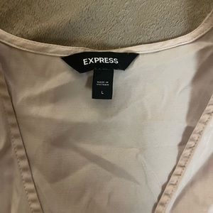 Express beige women’s bodysuit.